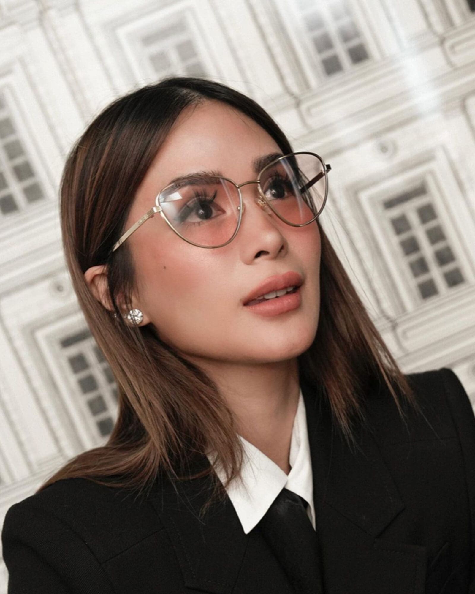Heart Evangelista wearing Rose-tinted cat-eye sunglasses from Gucci