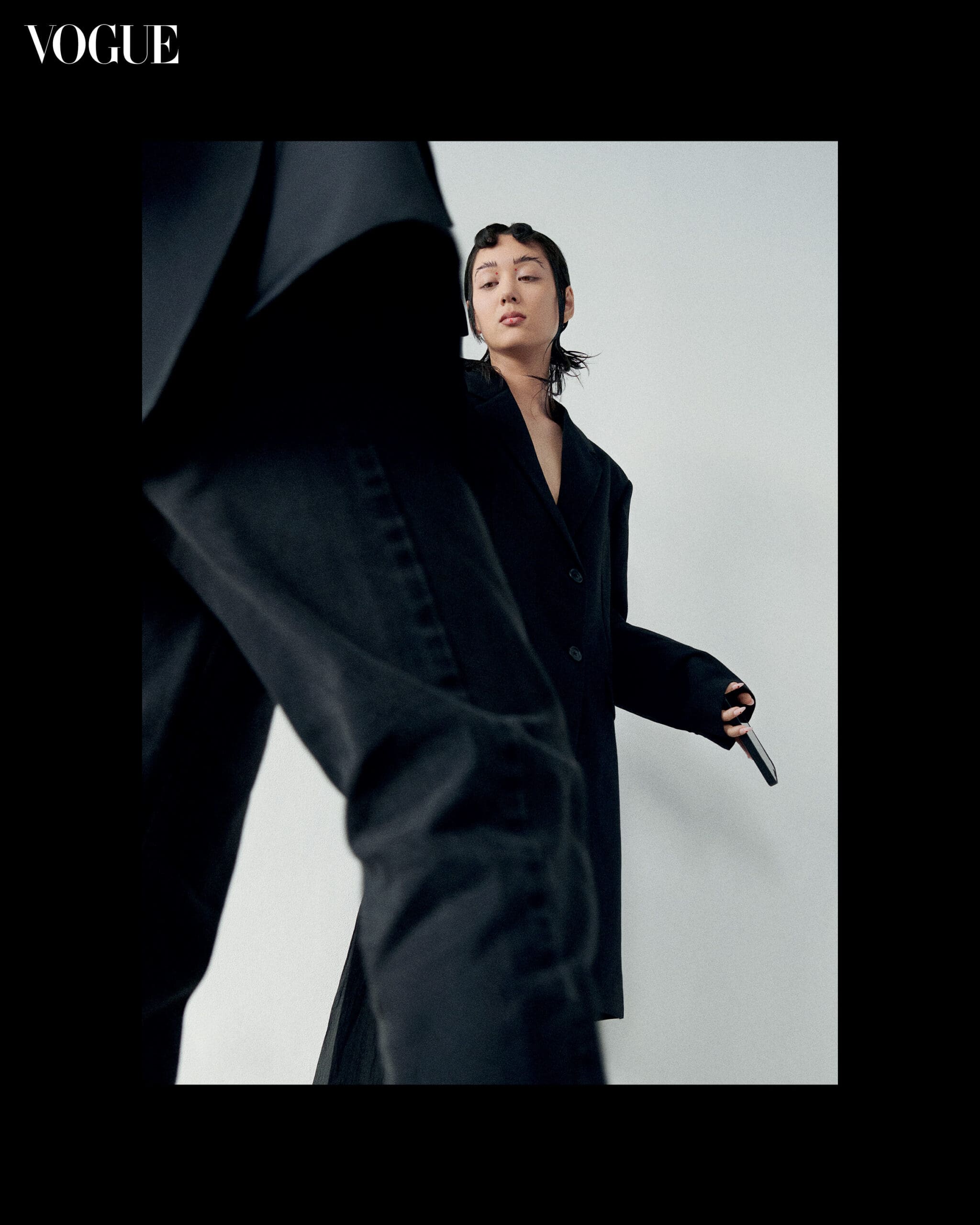 PRADA coat and pants. REPOSSI earrings. Photography and Styling by Melissa Levy