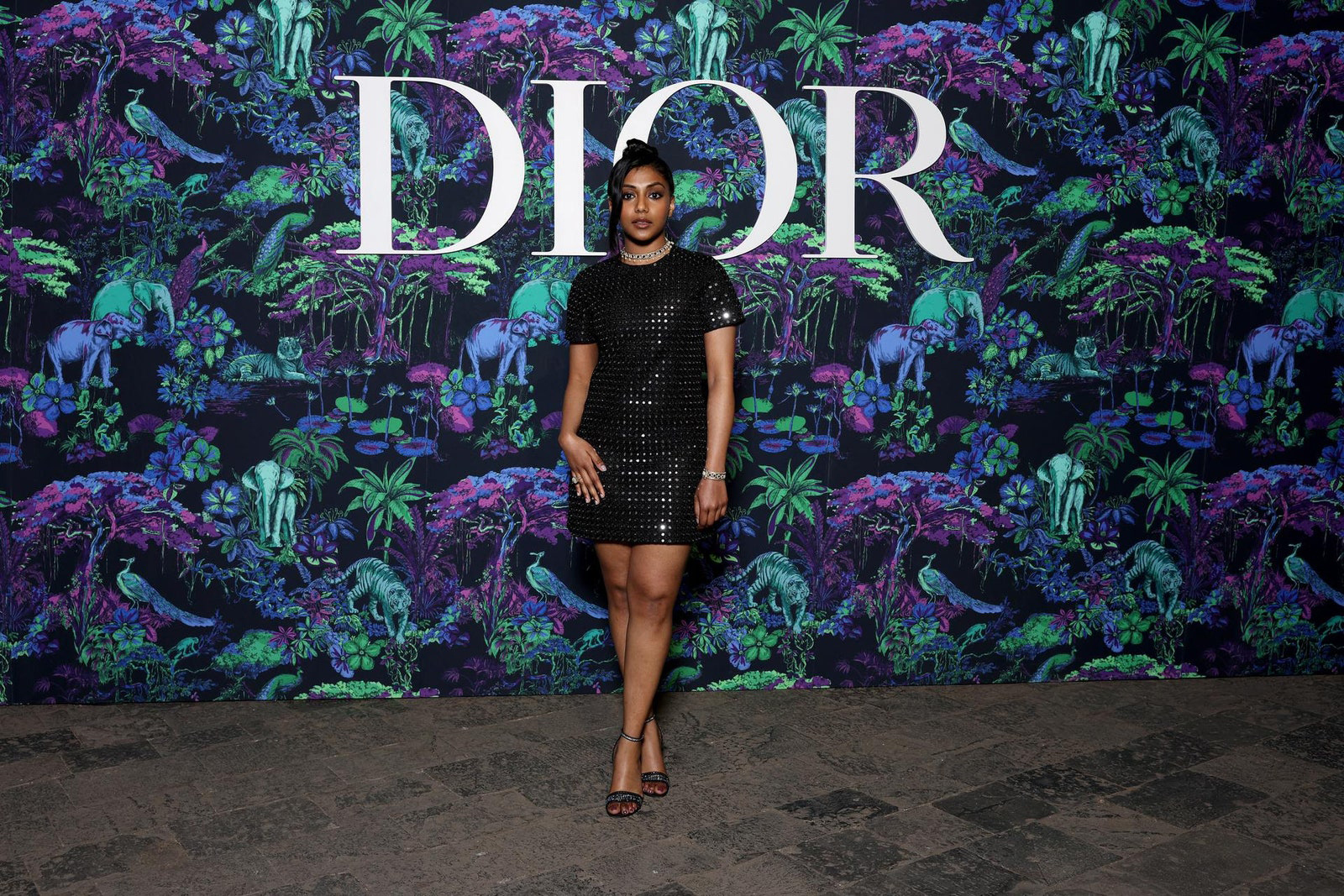 Dior Fall/Winter 2023 Show In Mumbai Charithra Chandran wore a Dior black silk embellished dress with Dior shoes.