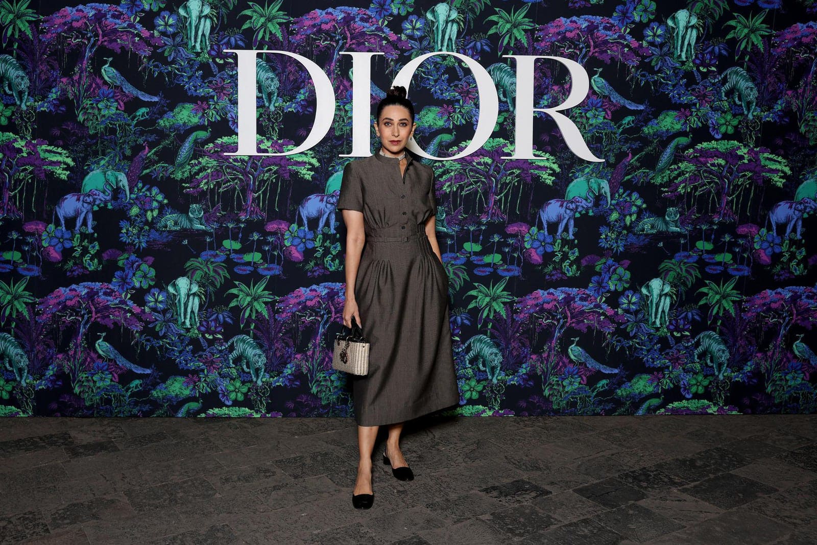 Dior Fall/Winter 2023 Show In Mumbai Karisma Kapoor wore a Dior Pre Fall 2023 grey cotton and silk dress