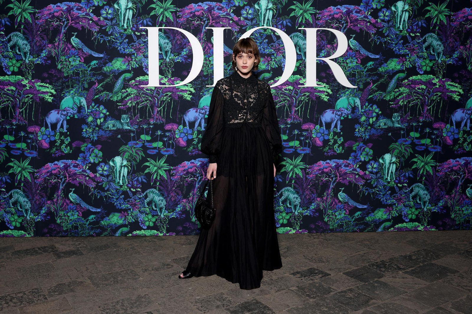 Dior Fall/Winter 2023 Show In Mumbai Mathilde Warnier wore a Dior Spring-Summer 2023 black embroidered cotton dress.