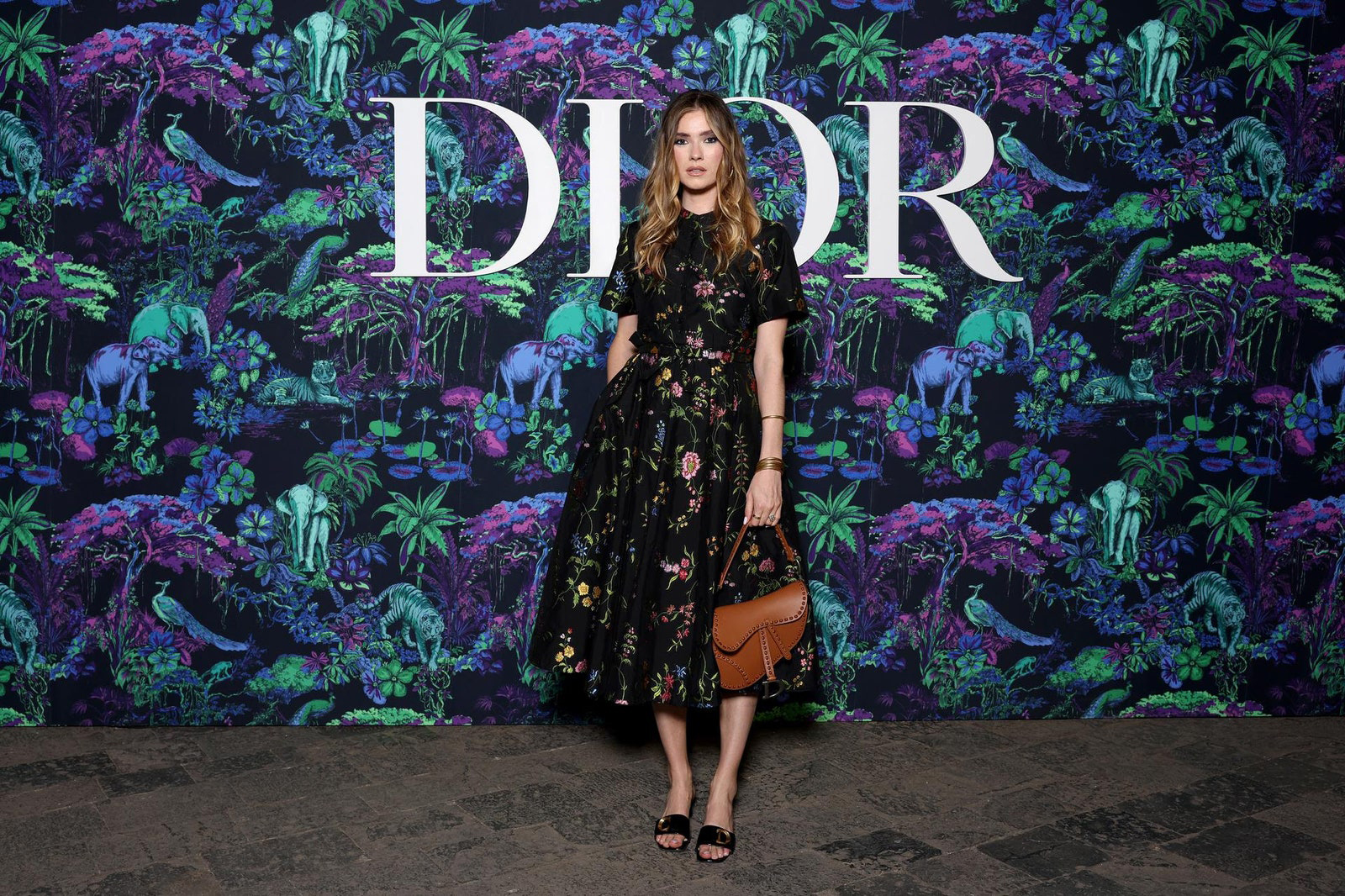 Dior Fall/Winter 2023 Show In Mumbai Zita d'Hauteville wore a Dior Spring-Summer 2023 black floral embroidered knit dress.