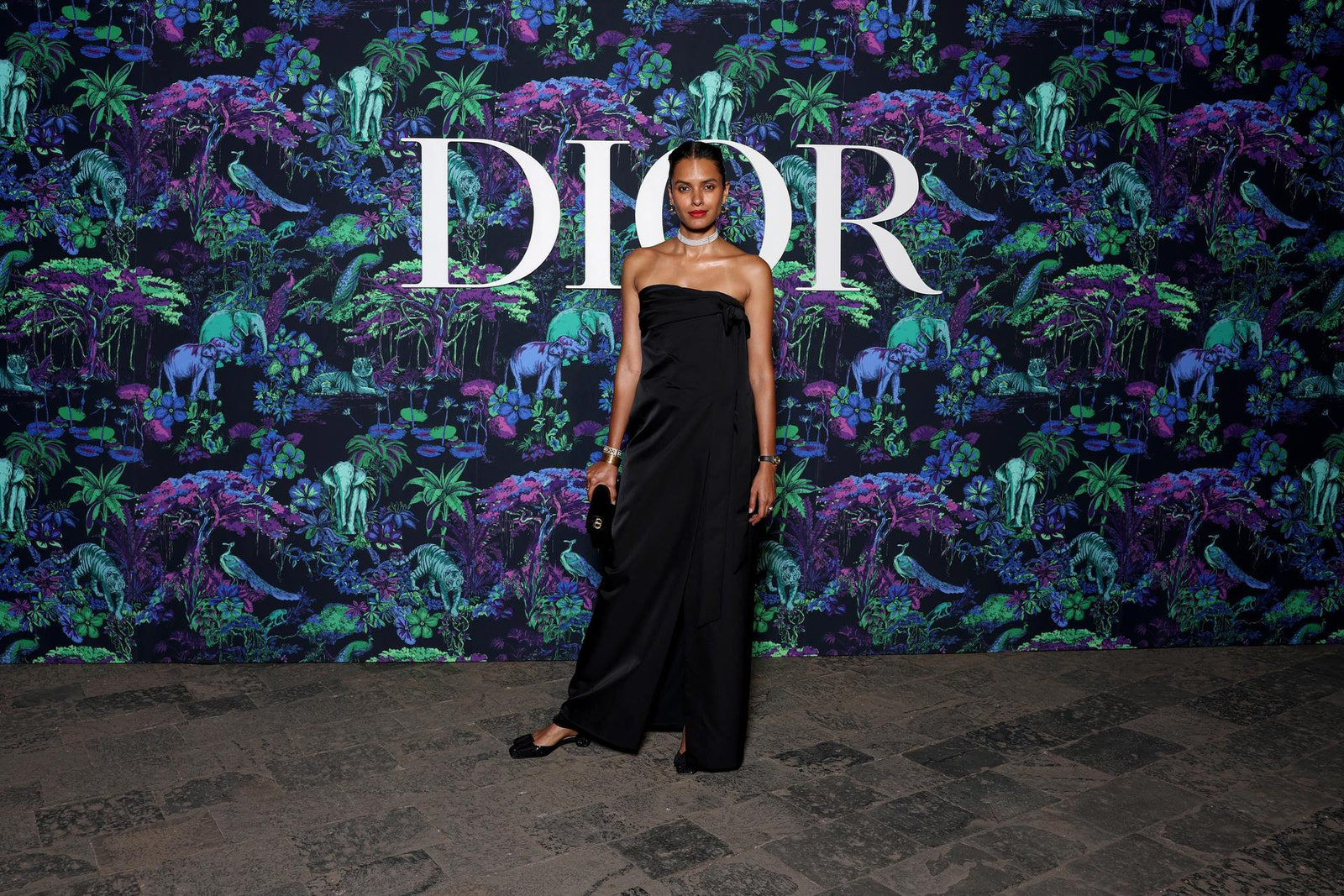 Dior Fall/Winter 2023 Show In Mumbai Lakshmi Menon wore a Dior Pre Fall 2023 black silk bustier dress.