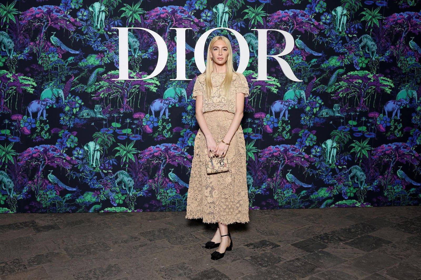 Dior Fall/Winter 2023 Show In Mumbai Sabine Getty wore a Dior Spring-Summer 2023 embroidered beige top and skirt.