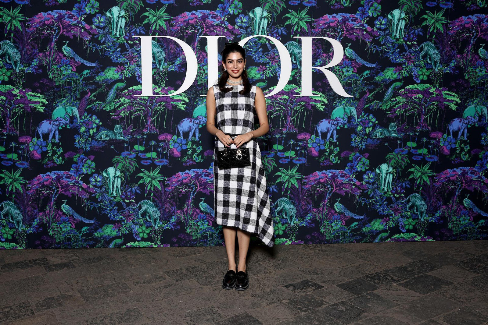Dior Fall/Winter 2023 Show In Mumbai Khushi Kapoor wore a Dior checked black and white wool top and skirt.