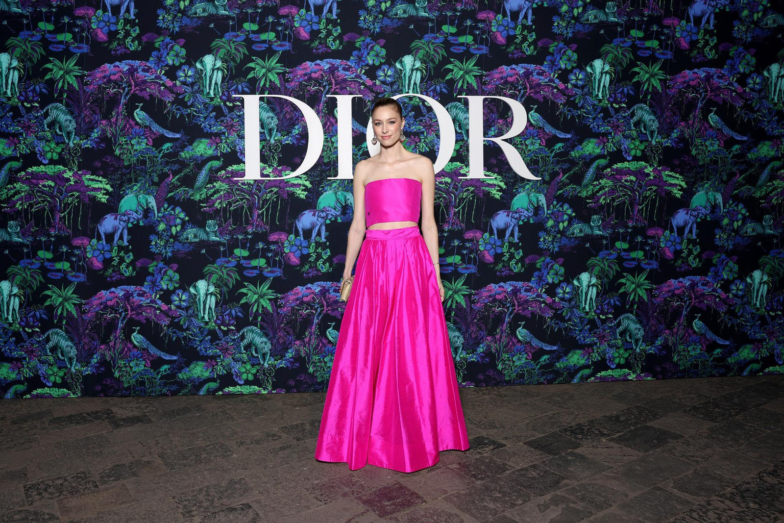 Dior Fall/Winter 2023 Show In Mumbai Beatrice Borromeo wore a Dior Pre Fall 2023 pink silk top and skirt.