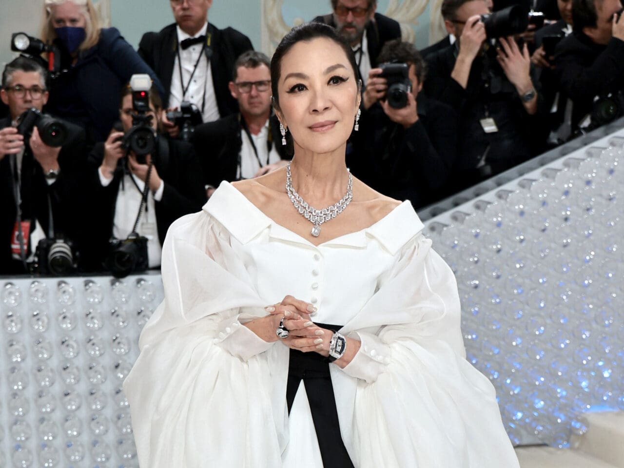 Michelle Yeoh wearing the Cartier [Sur]naturel High Jewelry necklace, and earrings in the Met Gala 2023