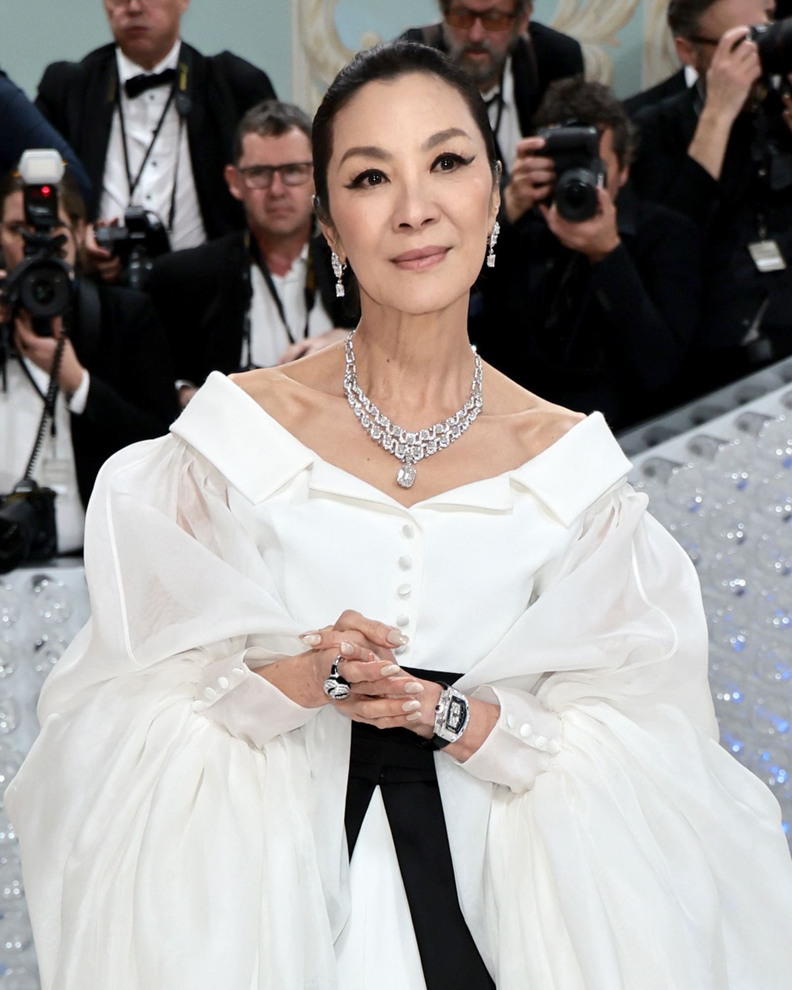 Michelle Yeoh wearing the Cartier [Sur]naturel High Jewelry necklace, and earrings in the Met Gala 2023