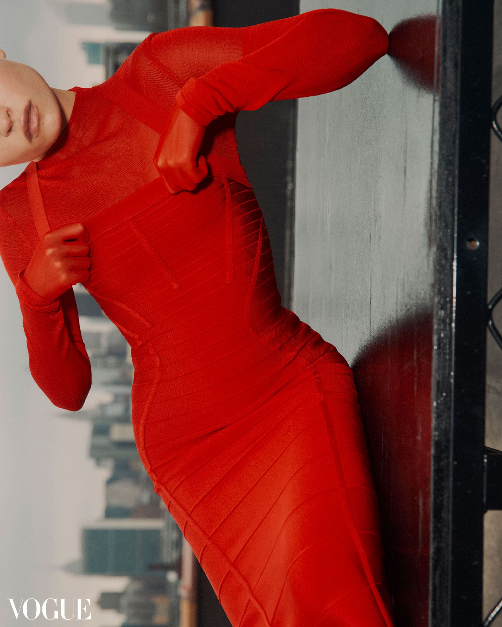 Photo of a woman wearing red Michelle Ochs dress