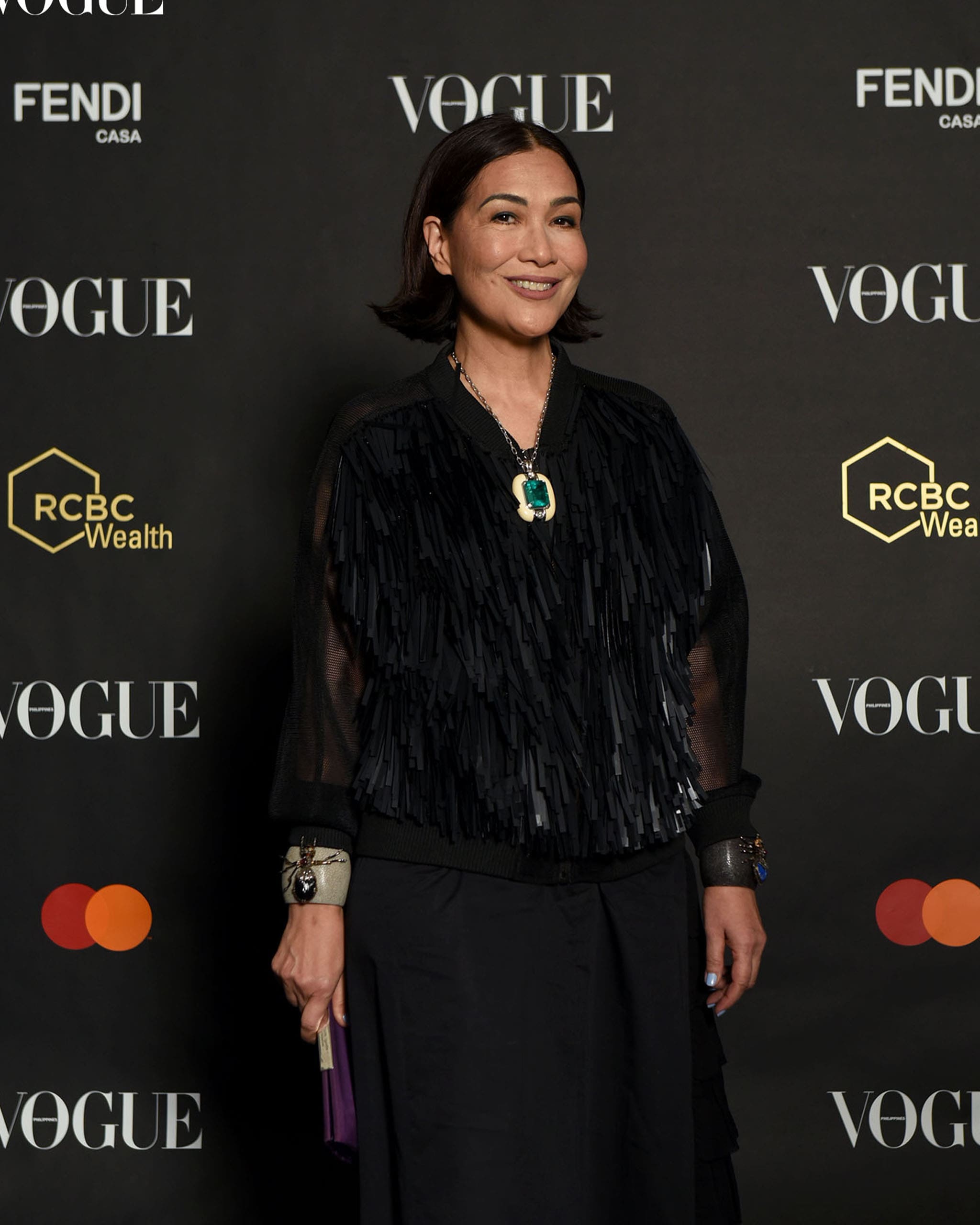 Tina Ocampo posing at the photo wall at the Vogue Philippines Gala 2023