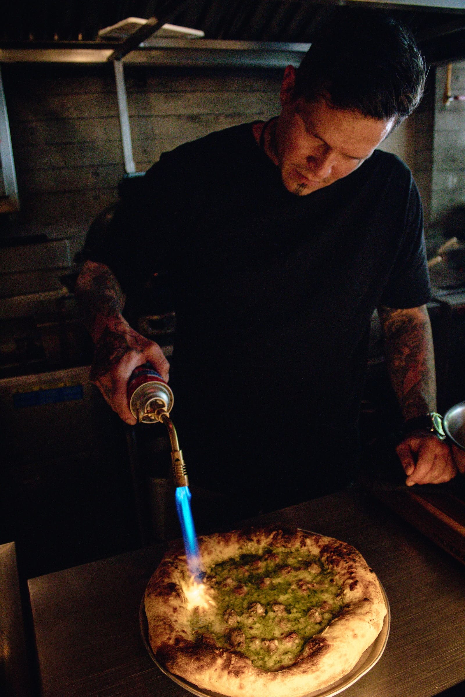 Firing a pizza at Anónimo. Courtesy of Anónimo