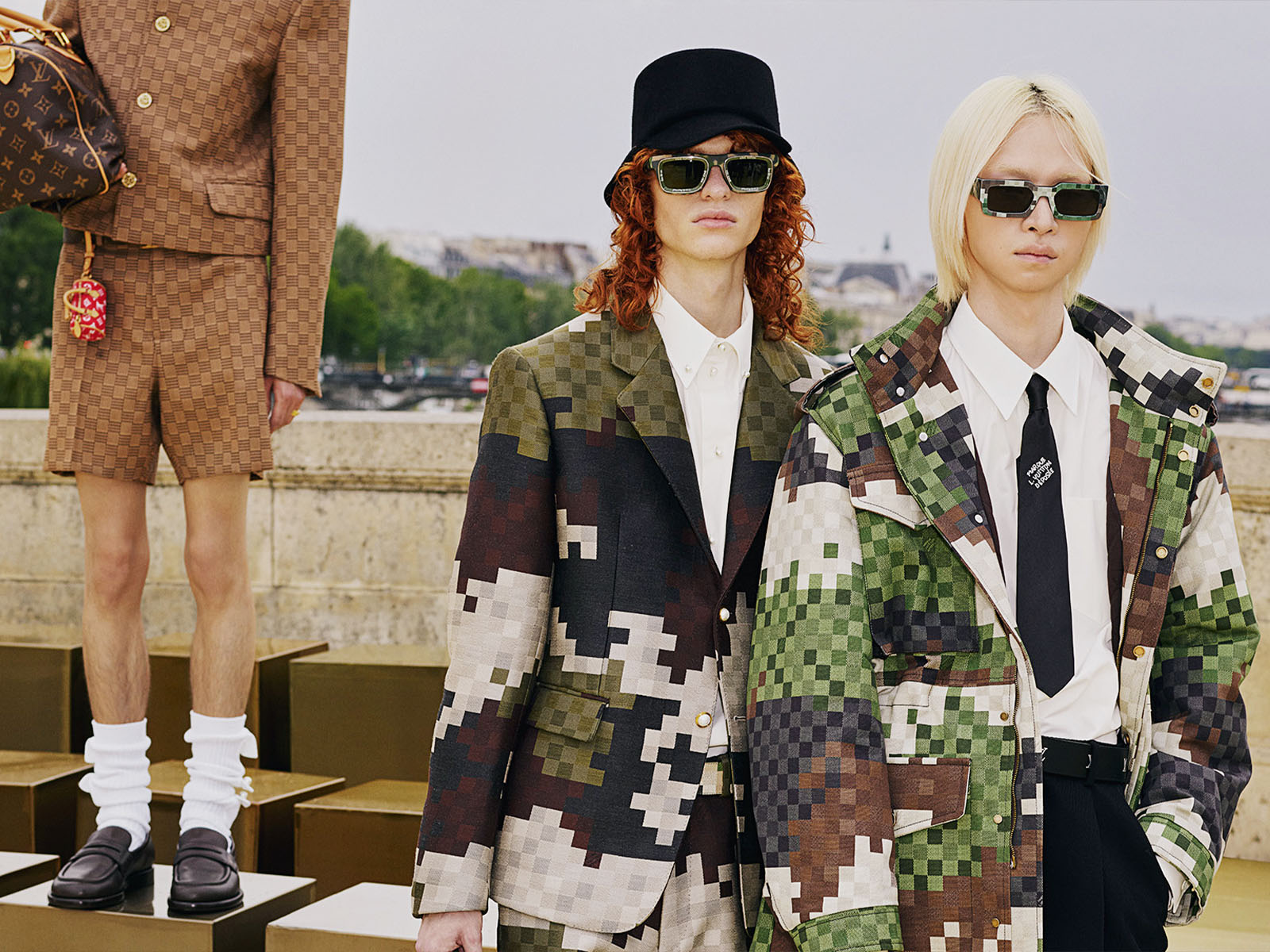 Louis Vuitton models with matching checkered ensemble