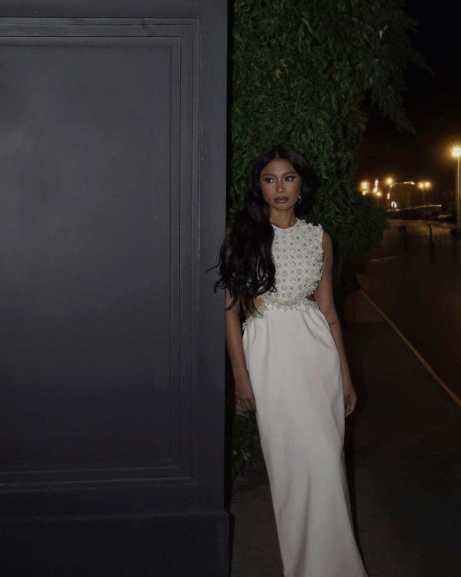 Nadine Lustre wears white archival Salvacion Lim Higgins dress.