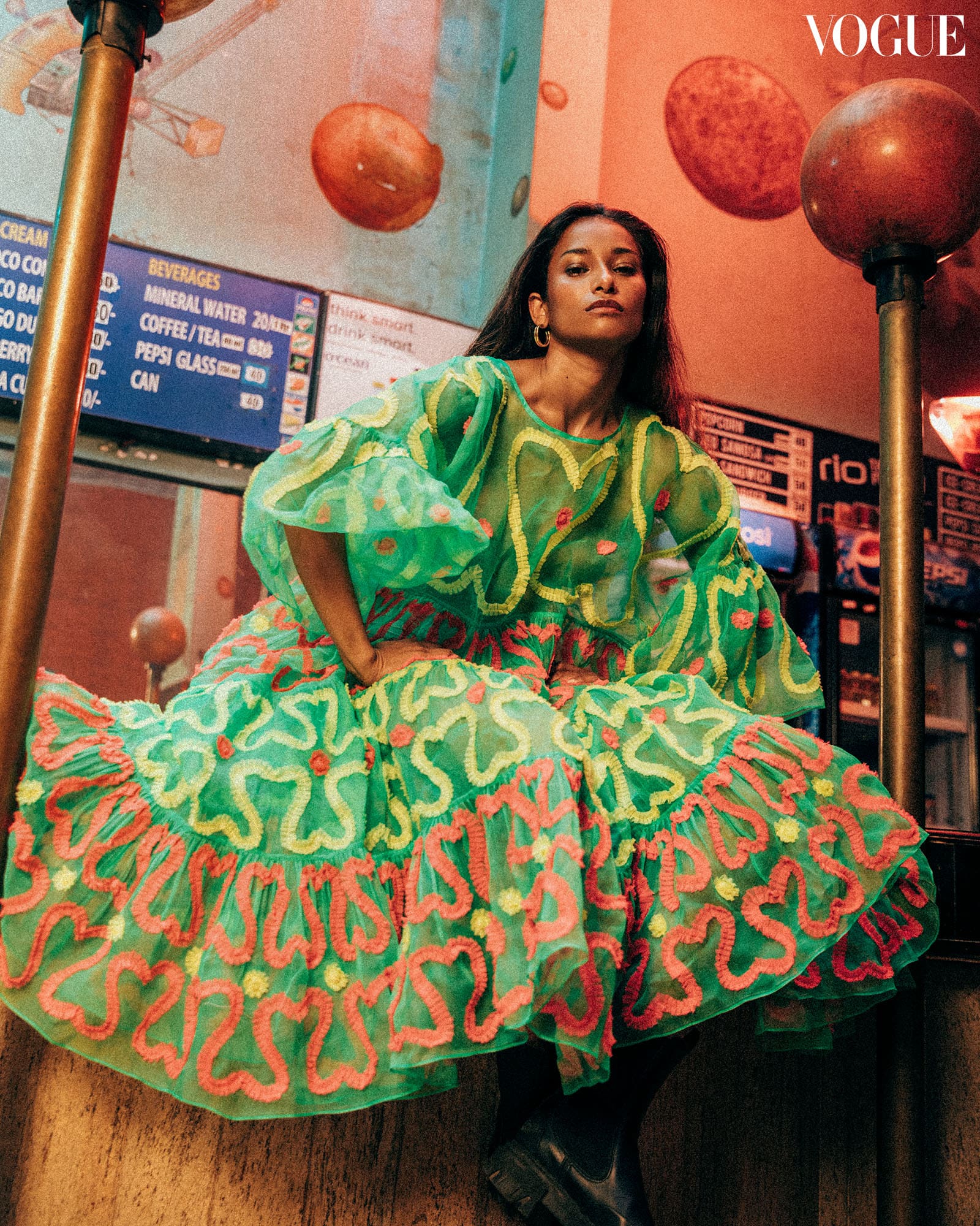 A green dress donned by a model inside the Gaiety Galaxy.