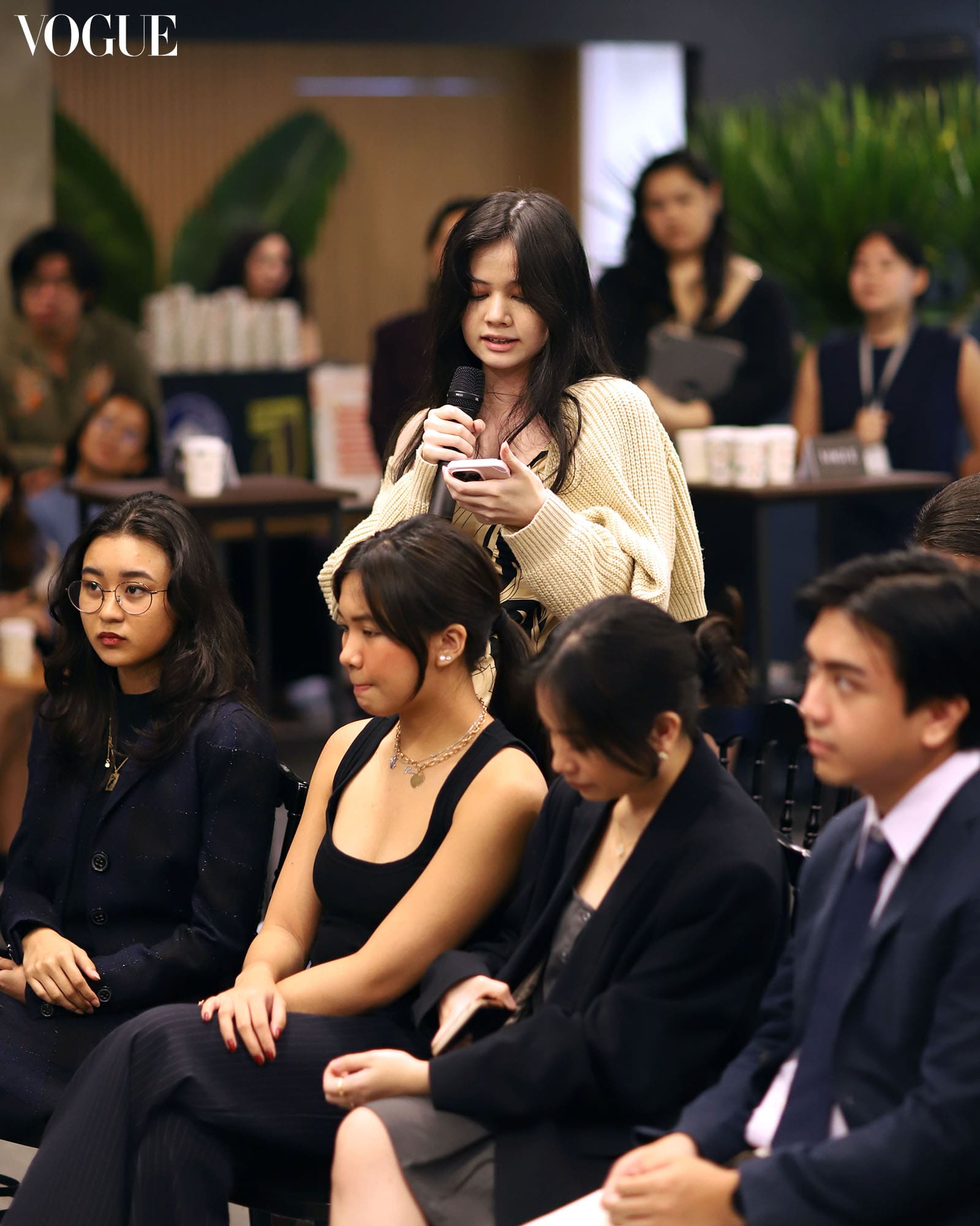 University student asks questions at Vogue Talks.