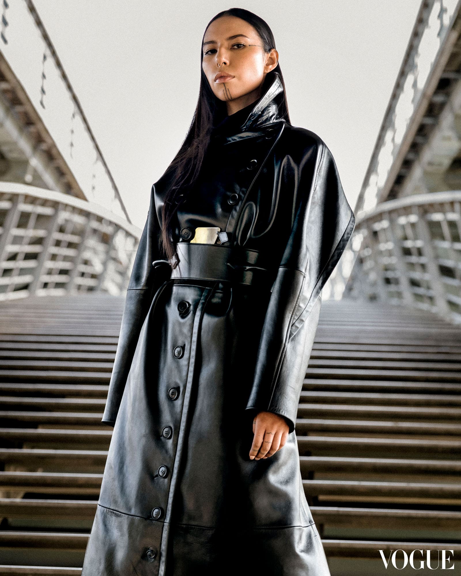 Model wearing a black Alaïa coat.