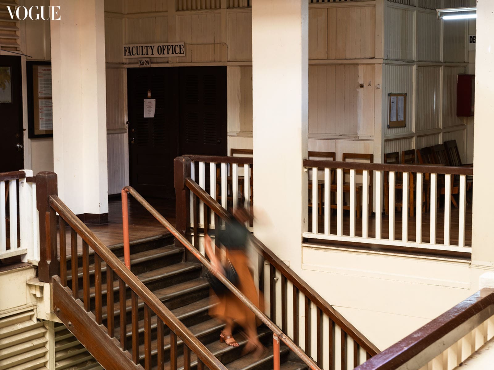 Woman walking down the stairs.