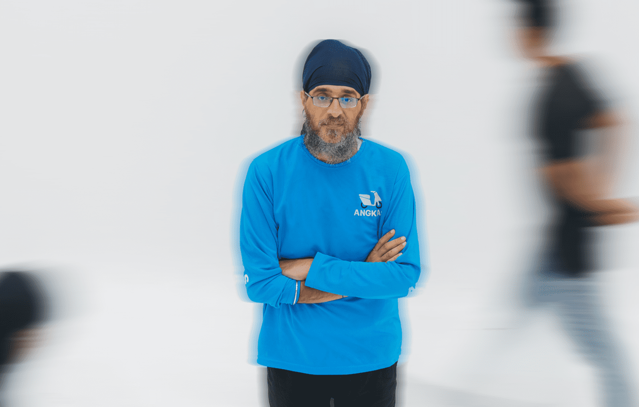 Harprit Singh Brar wearing Angkas' blue trademark long-sleeve shirt.