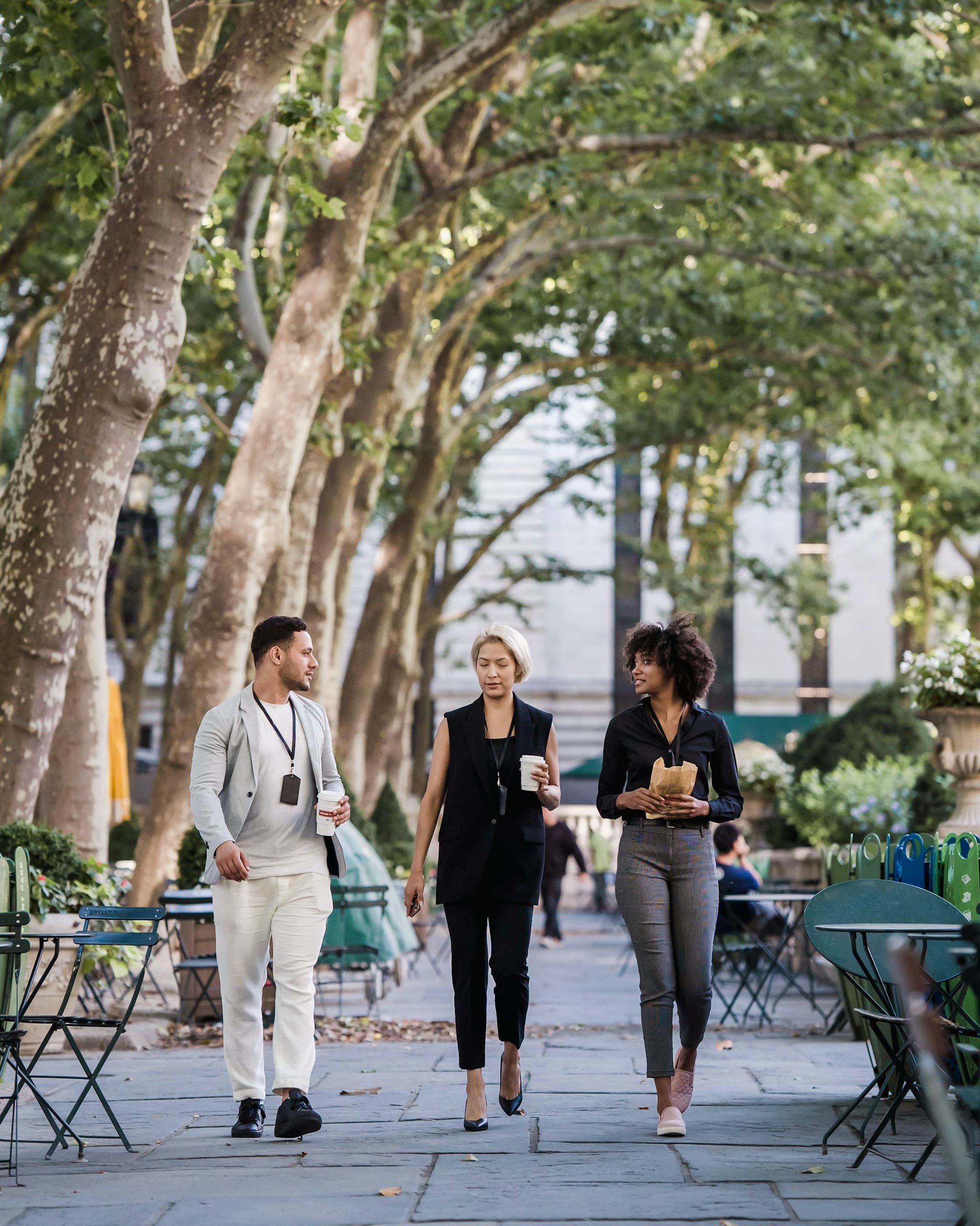 photo of office workers walking down a street by mizuno k | vogue philippines