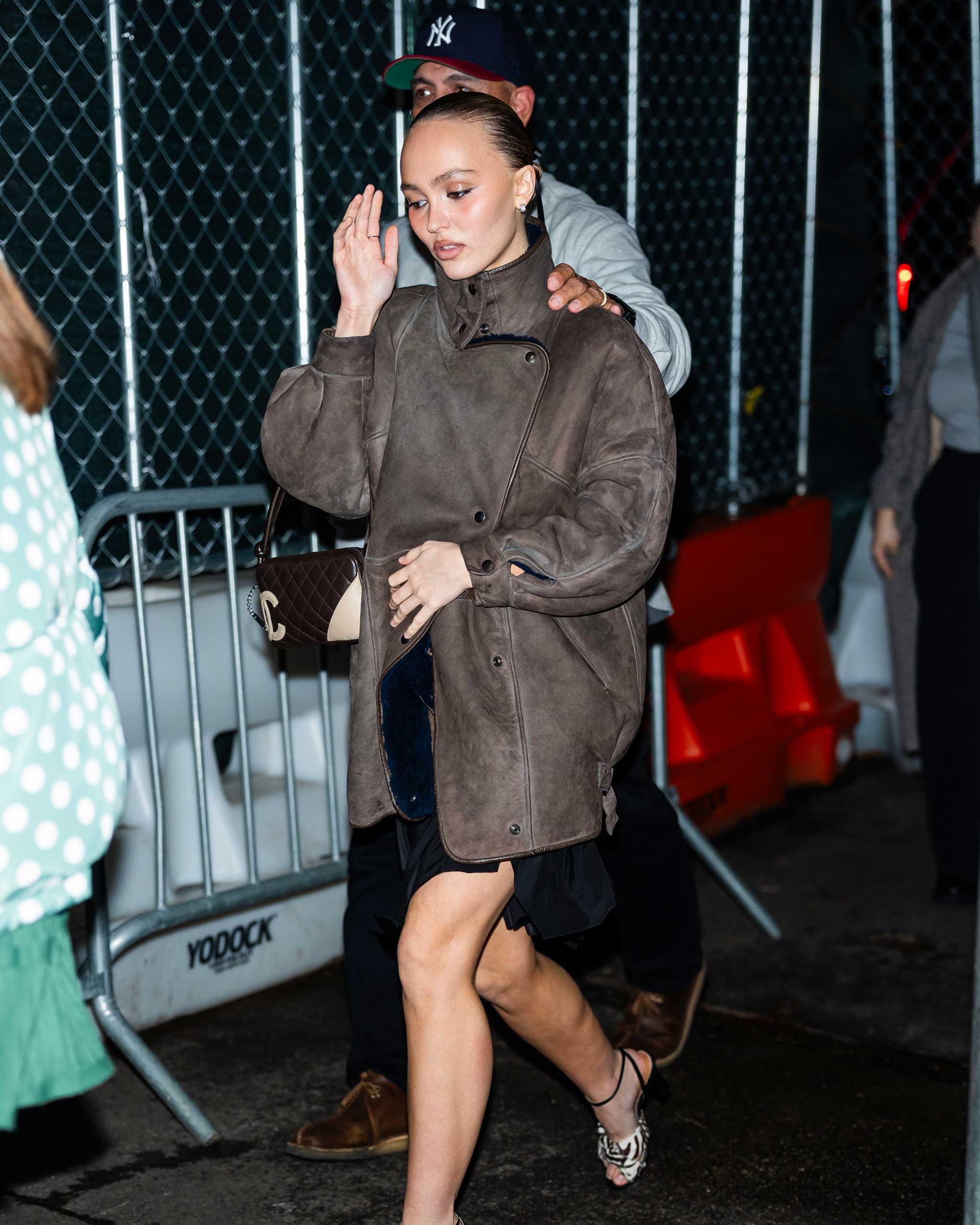 For the evening: actress Lily-Rose Depp wears an oversized jacket on the Nosferatu press tour sans-pants.