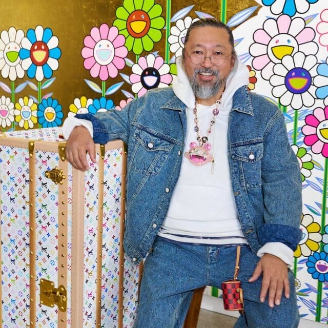 Takashi Murakami with a bespoke Monogram Multicolor trunk. Courtesy of Louis Vuitton