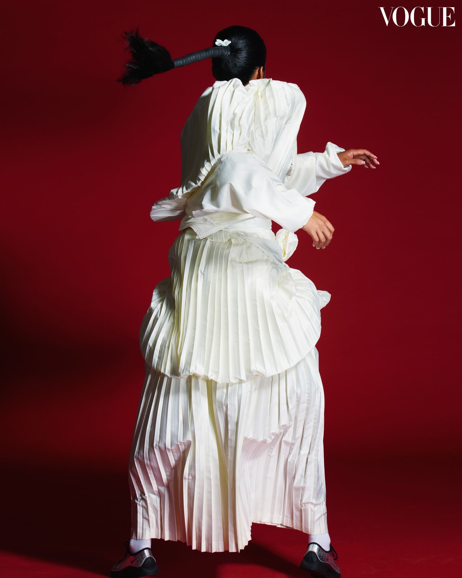 NIKE Pinstripe Suit and Air Superfly shoes. Photographed by Mark Nicdao